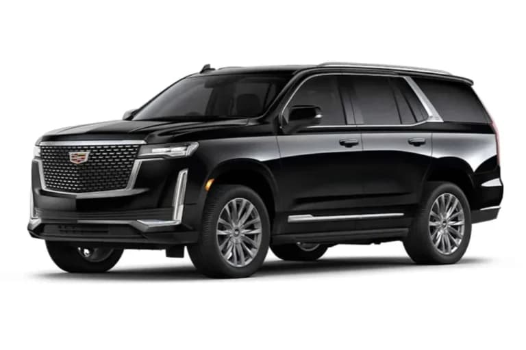 Black luxury SUV with grille and chrome accents.