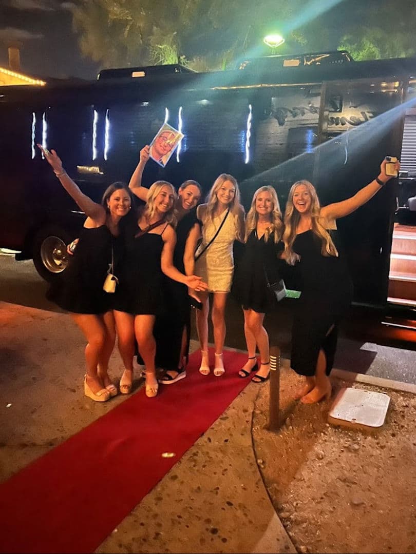 Bachelorette party poses by Scottsdale party bus